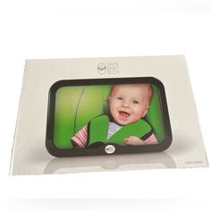 an open box with a baby's picture in it