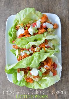 lettuce wraps with chicken and ranch dressing on them are ready to be eaten