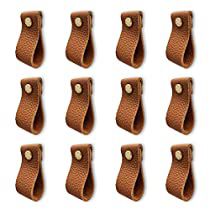 twelve pairs of brown leather shoe clips