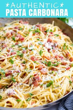 pasta with bacon and parmesan cheese in a pan on top of a table