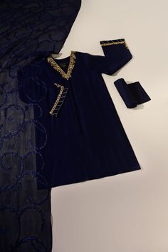 Ivy in adorned on pure navy blue cotton net with intricate hand craftmenship in an open shirt silhouette, perfect for pre/post wedding events, paired with matching embroidered net dupatta and pencil trousers, making this a crowd favourite. Delivery time: 4 to 6 weeks Blue Traditional Wear With Intricate Embroidery For Party, Blue Party Wear Traditional Outfit With Intricate Embroidery, Blue Party Wear Traditional With Intricate Embroidery, Blue Party Wear Sets With Intricate Embroidery, Royal Blue Sets For Party With Traditional Drape, Elegant Royal Blue Saree Set, Royal Blue Traditional Wear With Intricate Embroidery For Party, Blue Embroidered Party Wear Sets, Blue Embroidered Party Wear Dupatta