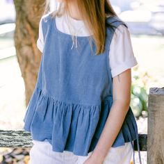 This chic corduroy peplum top combines style and comfort with its sleeveless design and adjustable fit. Perfect for layering or casual wear, its relaxed silhouette adds versatility to any wardrobe, making it an effortless choice for both everyday and chic looks. TOP DETAILS ⚬ Adjustable side ties. ⚬ The color of the top in the picture is Steel Blue.  FIT / SIZE ⚬ Relaxed Fit. ⚬ Handmade to order. ⚬ Sizes XXS to 7XL (please see detailed size chart in photos).  MODEL'S MEASUREMENTS ⚬ The model is Top Layering, Casual Tops For Women, Clothing Care, Casual Top, Steel Blue, Look Chic, Sleeveless Blouse, Womens Clothing Tops, Peplum Top