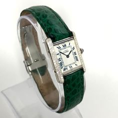 The Cartier Must de Cartier Tank Sterling Silver Diamond Women's Watch 20mm 0.5ct is a timeless classic. This Luxurious Cartier watch is pre-owned, in excellent condition, and comes in an original box with a full warranty from ItsHot.com. Whether you're looking for a classic timepiece or a luxurious statement piece, the  Cartier Must de Cartier Tank Sterling Silver Diamond Women's Watch 20mm 0.5ct is the perfect choice. Each watch can be additionally customized with diamonds (please contact us f Cartier Watches Women Tank Cartier, Cartier Rectangular Evening Watch, Elegant Cartier Watch With Tachymeter, Elegant Cartier Leather Watches, Formal Cartier Watch Accessories, Rectangular Shape, Diamond Jewelry Store, Cartier Tank, Cartier Watch, Women's Watch