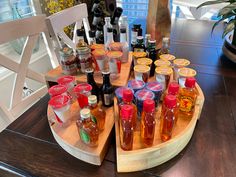 a wooden tray filled with lots of bottles