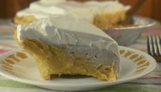 a piece of pie sitting on top of a white plate