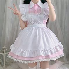 Kawaii Sweet Ruffled Maid Lolita Dress Experience elegance and cuteness with our Kawaii Sweet Ruffled Maid Lolita Dress. The ruffled design and maid-inspired style will make you stand out in any event. Embrace your inner sweetness and charm with this unique and playful dress. Size Info. XS: Bust 80 cm. Waist 64 cm S: Bust 84 cm. Waist 68 cm M: Bust 88 cm. Waist 72 cm L: Bust 92 cm. Waist 76 cm XL: Bust 94 cm. Waist 80 cm 2XL: Bust 100 cm. Waist 84 cm All measurements are approximate and can vary slightly. Please check size info. before order. Cute Ruffled Dresses For Cosplay, White Kawaii Dress With Lace Trim, Harajuku Dress With Ruffles And Doll Collar, Kawaii Ruffle Dress For Cosplay, Kawaii Ruffled Dress For Cosplay, Kawaii Doll Collar Dress With Ruffles, Fairy Kei Dress With Ruffles And Doll Collar, Anime Details, Female Uniform