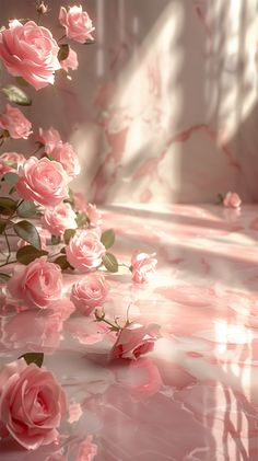 pink roses are floating in the air on a marbled surface with sunlight streaming through