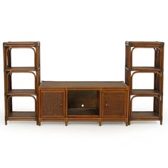 a wooden entertainment center with wicker shelves on each side and an open drawer below