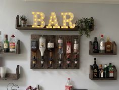 a bar with liquor bottles on the shelves