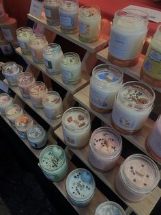 many different types of candles are on display