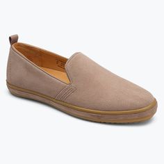 Our Sutton Slip On is constructed from the highest quality materials and paired with a timeless silhouette creating the perfect harmony of comfort and style. The premium Italian kid suede upper and seamless Italian leather lining provide comfort that lasts throughout even the longest days. In responsibility to our planet, we made our removable, cushioned footbed with castor bean oil and the outsole of wild natural rubber. Castor Bean, Cherry Tomato, Bill Blass, Stone Grey, Desert Boots, Perfect Harmony, Grey Stone, Natural Rubber, Italian Leather