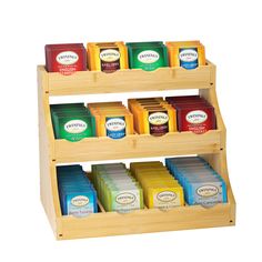 a wooden spice rack filled with different types of spices