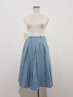 This is an incredibly made Vintage sky blue skirt with multiple pleats to give it shape, style and movement when twirling around. It is a solid heavy skirt but light to wear and with its tiny embroidered features throughout, it just makes this skirt that little extra special. Size 6 Measurements upon request. FIND MORE ON INSTAGRAM: ladymedusa_collection Asymmetrical Pleated Skirt For Summer, Spring Pleated Fitted Skirt With Folds, Fitted Pleated Wrap Skirt For Spring, Fitted Blue A-line Pleated Skirt, Pleated Flared Daywear Skirt, Summer A-line Skirt With Accordion Pleats, Pleated Waist Asymmetrical Skirt For Summer, Spring Pleated Relaxed Wrap Skirt, Asymmetrical Skirt With Pleated Waist For Summer