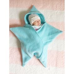 "This super adorable Baby Starfish Snuggie is perfect to keep your baby snug and cozy on chilly days and nights.  It is made of warm cozy fleece in an array of colors. Choose from one of the color choices or make a special request.  The Starfish Snuggie has a hood and the front cris crosses for easy to put baby in and out.  The Starfish measures:      Arm point to arm point- 22\"      Head point to a leg point - 25 1/2\"      This cute item like all I make is made with an eye for perfection and Baby Winter Wear, Baby Starfish, 4 Month Old Baby, Swaddle Sack, Battle Creek, Star Blanket, Baby Carriers, Baby Wrap Carrier, Baby Wraps