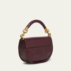 Chloe "Marcie" crossbody bag in shiny calfskin leather  Detachable top handle  Detachable chain/leather crossbody strap Can be worn as a top handle or crossbody bag  Flap top with magnetic closure  Interior, one slip pocket  Lining: Leather Approx. 6.2"H x 8.9"W x 2.8"D Made in Italy Luxury Saddle Bag With Detachable Strap And Top Handle, Luxury Saddle Bag With Double Handle For Formal Occasions, Luxury Formal Saddle Bag With Double Handle, Luxury Double Handle Saddle Bag For Formal Occasions, Luxury Saddle Bag With Top Carry Handle, Luxury Saddle Bag With Detachable Strap For Evening, Chic Evening Saddle Bag With Palladium Hardware, Luxury Satchel With Chain Strap And Top Handle, Evening Satchel Saddle Bag With Detachable Handle