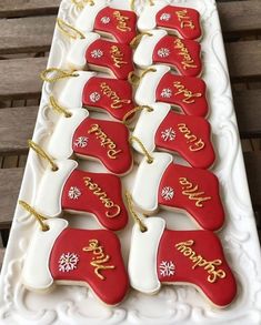 christmas cookies are arranged on a white platter