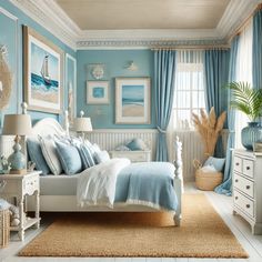 a bedroom decorated in blue and white with pictures on the wall above the bed, along with other furniture