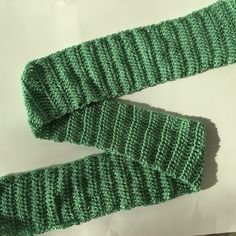 This hand-crocheted scarf is so soft and perfect for Winter! Made with love in Canada. Casual Knitted Infinity Scarf, Casual Hand Knitted Infinity Scarf, Green Yarn Scarves For Winter, Winter Green Yarn Scarves, Casual Hand Knitted Yarn Scarves, Casual Knitted Scarves, Cozy Crochet Yarn Infinity Scarf, Casual Green Handmade Scarf, Crocheted Scarf