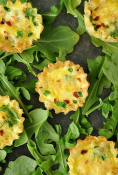 some food is laying on top of green leaves