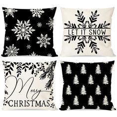 four black and white christmas pillows with snowflakes on the front, one for each pillow