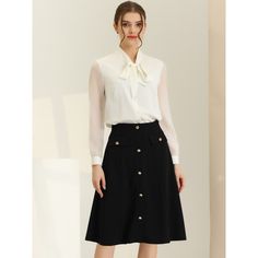 Incorporating this classic button-front skirt with an A-line cut into your wardrobe can elevate your everyday look to new heights. The charming decor button design adds a touch of elegance, making it suitable for any age and occasion. You can easily dress it up with a stylish ankle boot and a fitted knit or a fancy tie-neck shirt to add a touch of glamour to your outfit. Don't be afraid to experiment with different styles and make this versatile skirt a staple in your wardrobe. Chic Flared Skirt With Buttons, Chic A-line Skirt With Button Closure, Chic A-line Skirt With Buttons, Office Lady Pencil Skirt For Workwear, Classic Button-up Spring Skirt, Classic Flared Skirt For Workwear, Office Lady Skirt With Buttons For Work, Elegant Midi Skirt With Button Closure, Office Lady Flared Skirt For Workwear