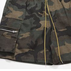 These camouflage cargo shorts allow for maximum mobility and breathability, thanks to their loose and relaxed design. With a stylish streetwear and high street pattern, this multi-pocket cargo short can help you dress to impress. Stand out in the crowd and show off your style. 60% cotton, 37% polyester, and 3% elastane Distressed Yellow drawstring closure Camouflage patten Elastic waist, drawcord, loose fit for comfort. Made from breathable, soft-washed material. Perfect for casual streetwear Si Khaki Military Shorts For Outdoor Activities, Military Style Khaki Shorts For Outdoor Activities, Combat Style Outdoor Shorts With Pockets, Combat Shorts With Pockets For Outdoor, Khaki Military Style Outdoor Shorts, Summer Military Cargo Pants For Outdoor Activities, Combat Cargo Shorts For Outdoor, Military Style Shorts For Outdoor, Military Style Shorts For Outdoor With Pockets