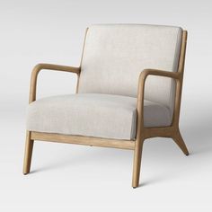 a white chair with wooden arms and legs