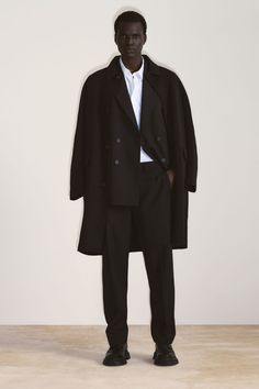 DOUBLE-FACED WOOL COAT - Black - COS Cos Coat Wool, Elegant Oversized Outerwear For Business, Elegant Business Oversized Outerwear, Elegant Oversized Business Outerwear, Timeless Structured Business Outerwear, Timeless Structured Winter Outerwear, Timeless Business Pea Coat For Fall, Black Wool Coat For Workwear, Black Structured Outerwear For Business Casual