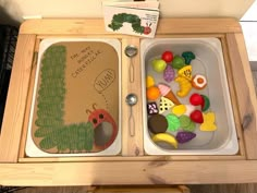 the very hungry caterpillar tray is filled with fruits and vegetables