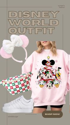 a pink sweatshirt with mickey mouse on it and other items in front of the image