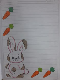 a child's drawing of a bunny with carrots on lined paper in front of it