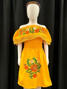 This beautiful embroidered Mexican floral dress with sunflowers and tulips is perfect for a special ocassion or fiesta. It has elastic on the waist. Sleeves can be worn up or down. Embroidered Flower Dress For Summer, Yellow Embroidered Fitted Dress, Yellow Floral Embroidered Dress For Spring, Yellow Embroidered Dress For Vacation, Orange Embroidered Fitted Dress, Fitted Yellow Dress With Floral Embroidery, Fitted Orange Embroidered Dress, Fitted Yellow Dress With Floral Applique, Fitted Embroidered Orange Dress