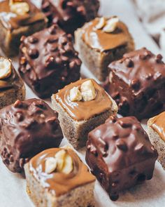 there are many different desserts on the tray