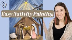 a woman standing in front of a nativity painting with the words easy nativity painting