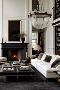 a living room filled with furniture and a fire place in the middle of a room