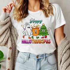 HalloThanksMas is a cute retro style Tshirt that covers all the holidays in one! Great gift idea for friends and teachers.  This classic unisex jersey short sleeve tee fits like a well-loved favorite. Soft cotton and quality print make users fall in love with it over and over again. These t-shirts have-ribbed knit collars to bolster shaping. The shoulders are tapered for a better fit over time. Dual side seams hold the garment's shape for longer. .: Made with 100% Airlume combed and ring-spun co Style Tshirt, Thanksgiving Shirt, Holiday Shirt, Fall Shirt, Thanksgiving Shirts, Retro Halloween, Holiday Shirts, Fall Shirts, Christmas Shirt