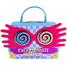 a pink and blue handbag with sunglasses on it's face, in front of a white background