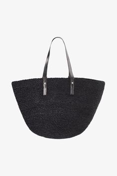 The MIMI Jute Bag with Leather Straps is your go-to for beach vacations. Durable jute, chic leather straps, and a spacious interior make it the perfect seaside essential. Black Straw Bags With Large Capacity, Black Straw Tote Bag, Chic Leather-handled Bucket Bag For Beach, Everyday Black Straw Bag, Black Summer Beach Bag For Everyday, Black Tote Beach Bag, Black Beach Bag With Adjustable Strap For Beach Season, Black Straw Summer Bag, Chic Beach Shoulder Bag With Leather Handles