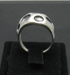 Stylish sterling silver ring,crater 925/1000. Stamped 925.Approximate weight 7.2 grams. Top width 1.5cm (0.60 inches). All our jewels are made from solid sterling silver 925/1000 and are carefully crafted by hand in our family workshop. We dispatch your orders in 5 working days, worldwide and the postage is $5. We ship registered priority mail. Please allow 5-7 working days for delivery in Europe and 10-15 working days outside Europe. For any questions - please do not hesitate to contact me! Sterling Silver Concave Ring Stamped 925, Sterling Silver Hallmarked Dome Ring Collectible, Sterling Silver Hallmarked Dome Ring For Collectors, Collectible Sterling Silver Hallmarked Dome Ring, Silver Hallmarked Dome Ring, Sterling Silver Concave Dome Ring As Gift, Modernist Sterling Silver Dome Ring As Gift, Modernist Sterling Silver Dome Ring, Modernist Silver Dome Ring As Gift