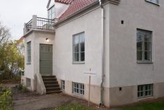 a house with stairs leading up to it