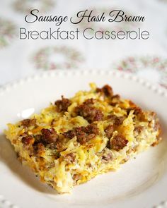 sausage hash brown breakfast casserole on a white plate with the title above it