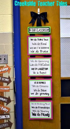 a classroom door decorated with wooden signs and bows for teacher's appreciations in our classroom