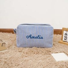 "Crafted with attention to detail, this Monogrammed Toiletry Bag is not just a practical necessity but also a stylish statement piece. Whether it's a bridal gift, baby gift, birthday surprise, or a bridesmaid makeup bag, this cosmetic pouch is designed to impress. ✿ Compact Size: Measuring at a convenient 8.5\"*3\"*5.5\", this cosmetic bag is the perfect size to fit into your handbag or carry-on luggage. ✿ Vibrant Color Selection: Choose from an array of delightful colors including Green, Pink, Personalized Toiletry Bag, Bridesmaid Makeup Bag, Personalized Pouch, Birthday Bag, Personalized Makeup Bags, Bridesmaid Makeup, Bridal Gift, Blue Gifts, Grad Gifts