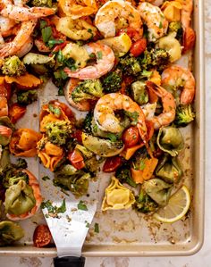 This sheet pan shrimp and vegetables is super easy, delicious and satisfying. Roasted veggies, cheese tortellini, shrimp and lots of lemon, garlic and olive oil take this over the top. It's fresh, bright, vibrant and filling. A must make!