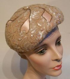 1950s Evelyn Varon pale pink satin and sequin cocktail hat. A French milliner who's hats were so unique they started copying them in 1914. Stores in the US offered knockoffs of her French hats and then she ended up in the US designing for the US market. Wear straight on or tilted to the side as seen in the center photo. Available at RoadsLessTravelled2 on Etsy. Vintage White Headpieces For Evening, Vintage Cream Hat For Evening, Vintage Cloche Party Hat, Vintage Cloche Costume Hat For Party, Vintage Cream Fascinator For Evening, Vintage Beige Fascinator For Evening, Fitted Retro Party Headpieces, Retro Headpieces For Party, Vintage Cloche Headpieces For Evening