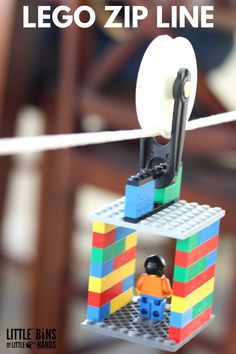 the lego zip line is made out of lego blocks and has a man on it