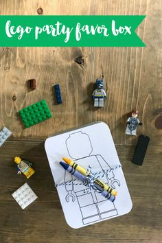 lego party favors box with crayons on the table