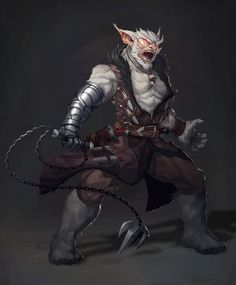 an animal with horns and chains on it's back, standing in front of a dark