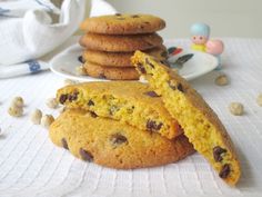 several cookies are stacked on top of each other with one broken in the middle and another half eaten