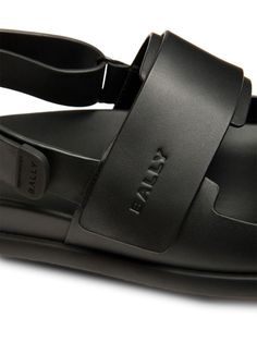 Bally logo-debossed Leather Sandals - Farfetch Leather Sport Sandals With Logo Strap For Summer, Black Calf Leather Slingback Sandals With Removable Insole, Leather Sandals With Logo Strap, Leather Sandals With Logo Strap And Round Toe, Black Leather Sport Sandals With Buckle Closure, Casual Leather Sandals With Logo Strap, Designer Black Leather Slingback Sandals, Black Leather Sport Sandals With Leather Footbed, Modern Sport Sandals With Buckle Closure